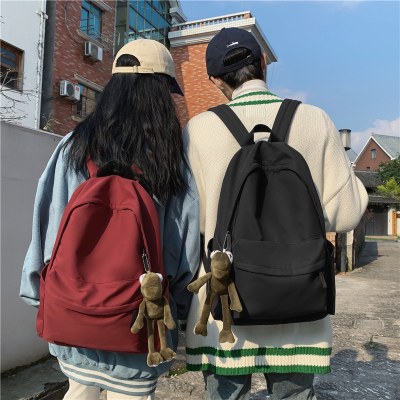 新入生通学メンズ韓国語版原宿スタイルモノクロバックパック女性のファッションイントレンド大容量バックパック