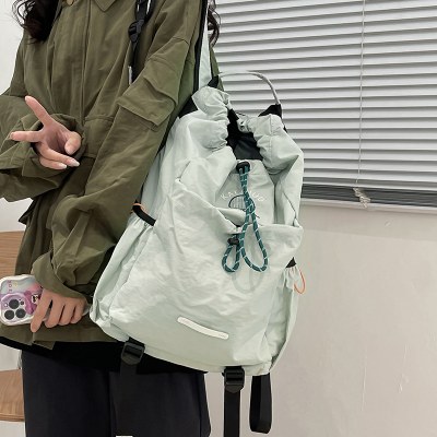 バックパック女性の大容量シンプルな多用途バックパックスポーツ女性のファッション軽量トラベルバッグ卸売カスタマイズ