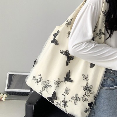 超美しい刺繍黒蝶キャンバスバッグレース妖精カジュアル 旅行 レディースバッグ文学大容量多用途ショルダーバッグ