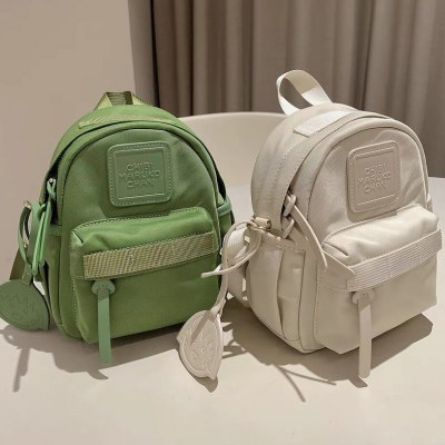 日本製ミニコンパクトバックパック無地明るい色マカロンカラーグリーン小さなバックパック旅行やショッピングのための新しいスタイル