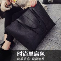 テクスチャードバッグ女性の夏のハイエンド 2024 新しいポータブルトートバッグ黒防水ハンドバッグ大容量