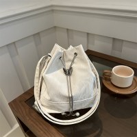 シンプルなレトロな英国のバックパック、今年の新しいショルダーバッグ、巾着バケツバッグ、デザイン通勤学生バックパック