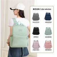 新しい韓国のファッションバックパック女性のためのシンプルな大容量学生ナイロンバックパック無地軽量トラベルバッグ