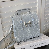 女の子ニッチデザイン弓バックパック女性の 2024 新しい夏のファッション高探し学生小さなバックパック