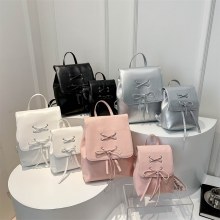 韓国スタイルの弓バックパック女性の 2024 新しいトレンディなファッションバックパックかわいいポータブルショルダーバッグスクールバッグ