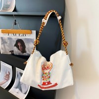 バッグ女性の新しいファッショントレンドキャンバスバッグシンプルカジュアル大容量学生スクールバッグショルダーバッグ