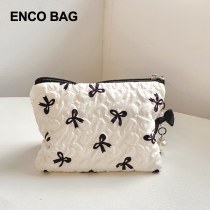 新しい韓国スタイルの白い弓イン怠惰な収納袋ポータブル旅行化粧品バッグハイエンドハンドバッグ今