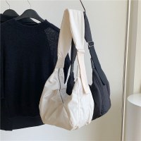 韓国の大容量ワイドショルダーストラップキャンバスバッグクロスボディバッグ女性インニッチデザインシンプルな団子バッグショルダーバッグ