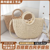 新しい女性のショルダーバッグ紙ロープ織夏屋外通気性わらバッグカジュアル多目的ビーチ女性のバッグ供給