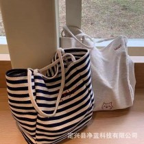 ストライプキャンバスバッグ「ハッピーパピー」ニッチ刺繍大容量レイジースタイル トートバッグ カジュアルショッピングバッグ