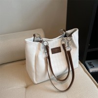女性用バッグ 2024 春新作 ハイエンド ニッチ トレンド 通勤バッグ 多用途 ショルダー 大容量 トートバッグ