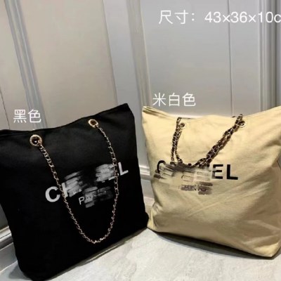 おしゃれなポータブルキャンバスチェーンバッグ、中古の大容量トートバッグ、芸術的なカジュアルバッグ、ショルダーバッグ、Xiaoxiangショッピングバッグ