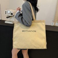 女性のためのカジュアルな大きなバッグ新しいファッションカジュアルキャンバスショルダーポータブル大容量学生クラスの通勤トートバッグ