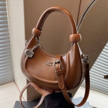 シンプルなレトロな脇の下カジュアル三日月バッグ女性のための 2024 新しいトレンディなファッション通勤高品質ポータブルクロスボディバッグ