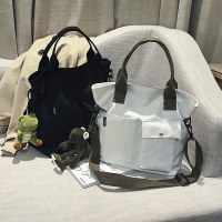 女性のためのバッグ 2023 新しいトレンディな韓国スタイルのファッショントートキャンバスバッグ多用途クロスボディバッグ大容量ショルダーハンドバッグ