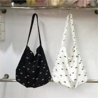 ボウキャンバスバッグ、ニッチ、新鮮で多用途、大容量、怠惰なスタイルのショルダートートバッグ、学生のショッピング