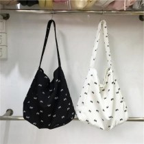 ボウキャンバスバッグ、ニッチ、新鮮で多用途、 大容量 、怠惰なスタイルのショルダートートバッグ、学生のショッピング