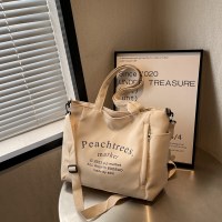 キャンバスバッグ レディース 大容量 2023 新しいファッション 多用途 ワンショルダー クロスボディバッグ 質感 春と夏の通勤トートバッグ