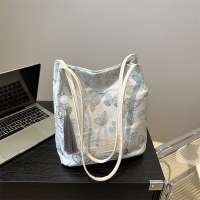 新しい中国刺繍サテンバッグ 2024 新しい夏ニッチデザインショルダーポータブルクロスボディバケットバッグ
