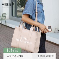 新しいハイエンドのレトロレタートートバッグ、韓国スタイルのニッチハンドバッグ、韓国のショルダークロスボディバッグ