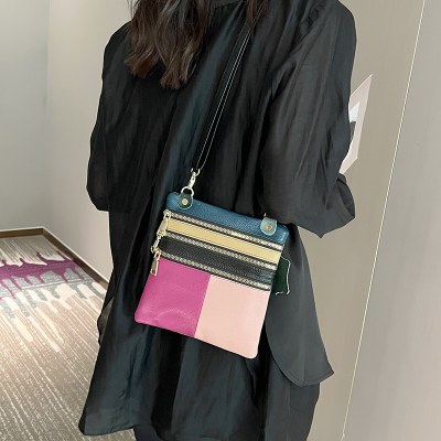 牛革バッグ女性の 携帯 電話小銭入れ 2024 新しいスタイルのトレンディなクロスボディバッグシングルショルダー小さなバッグ第一層牛革ステッチレディースバッグ