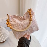ビーズ脇の下バッグ 2024 新レトロ女性のワンショルダーファッション多用途ニッチ通勤トートバッグ