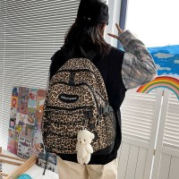 日本の原宿イン香港スタイルのレトロヒョウ柄学生スクールバッグ韓国語バージョン多用途大容量バックパック女性のための