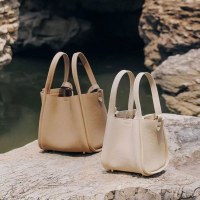 中野菜バスケットソングシリーズ女性デザイナーファーストレイヤー牛革大容量通勤ポータブルバケツバッグ