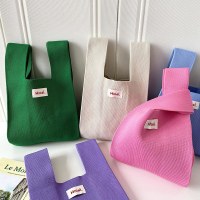 ニットバッグ ハンドバッグ ハンドバッグ 学生 ハイエンド ソリッドカラー シンプル ウーブン リストバッグ 女性用