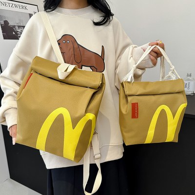 マクドナルドのスクールバッグ 2024 新しいレタープリント紙バッグバックパックパーソナライズされた大 学生 ショルダーバッグ