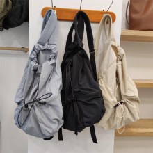 日本と韓国の巾着バックショルダーバッグ原宿スタイル大容量学生スクールバッグカジュアル多用途プリーツナイロンキャンバスバックパック