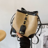 韓国のファッションバッグ女性のための新しい秋と冬のレトロ通勤ストラップバケットバッグハイエンドクロスボディバッグ