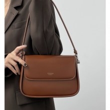 サドルバッグの女性の高品質バッグ 2024 新しいファッションニッチ本革脇の下クロスボディバッグ女性のための