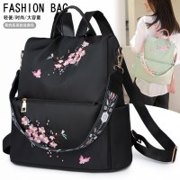新しいスタイルのバックパック小さなバックパックレディースファッションエスニックスタイルバッグ刺繍シンプルなハイエンドライトトラベルバッグ