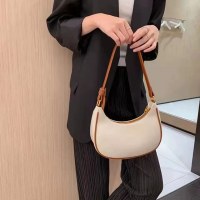 高級脇の下バッグ、半月バッグ、女性用の新しいニッチデザインバッグ、トレンディな初秋の三日月型ハンドバッグ