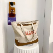 新しいオールマッチ韓国スタイルショルダーキャンバスバッグ通勤ポータブル大容量トートバッグ外出エレガントな女性のバックパック